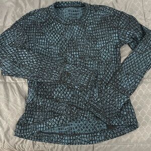 Lululemon slim fit running long sleeve top. Size medium. Thumb holes and pocket